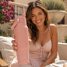IZY Travel Bottle - Salmon - lifestyle